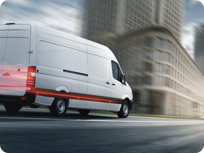 Delivery van on the road at high speed